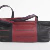 luxe design tas tassenontwerpster Krista van Dijk zwart donkerrood donkerpaars met streep en oog voo