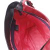 lichtgekleurde voering crossbody tas met vakjes en ritsen Krista van Dijk label zwart felrood paars leer.jpg